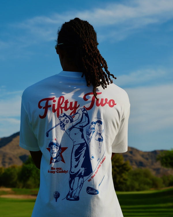 Close-up of the Be My Caddie Tee's full back graphic — "Fifty Two" script, vintage golfer illustrations, and "Be My, Be My Caddy!" text.