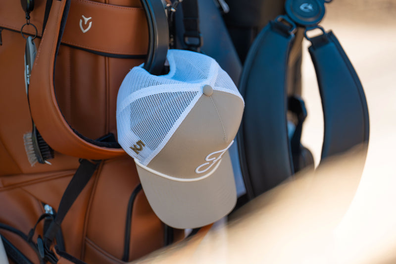 Golf Hat Hanging from Golf Bag