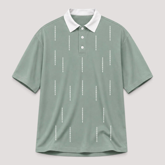 A sage green short-sleeve polo shirt with a white collar and white vertical dashed line patterns, displayed on a neutral light gray background.