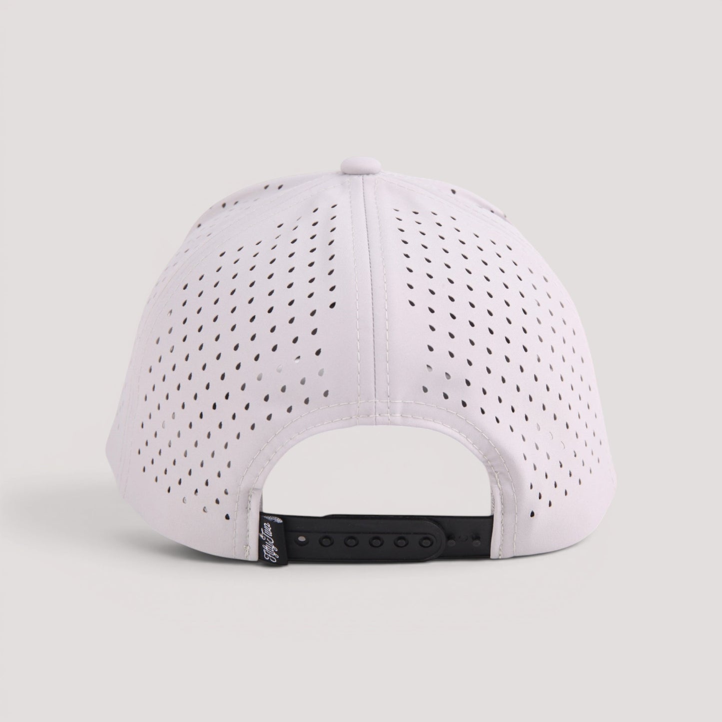 Grey golf hat with perforated ventilation holes and an adjustable black snapback strap, shown from the back on a light gray background.